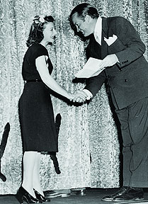Barbara McLean receiving her Academy Award in 1945 from Bob Hope for her work on Wilson (1944)